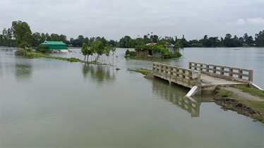 বিপৎসীমার ওপর দিয়ে প্রবাহিত হচ্ছে কুড়িগ্রামে দুধকুমারের পানি বিপৎসীমার ওপর দিয়ে প্রবাহিত হচ্ছে কুড়িগ্রামে দুধকুমারের পানি